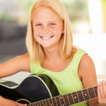 Girl playing guitar